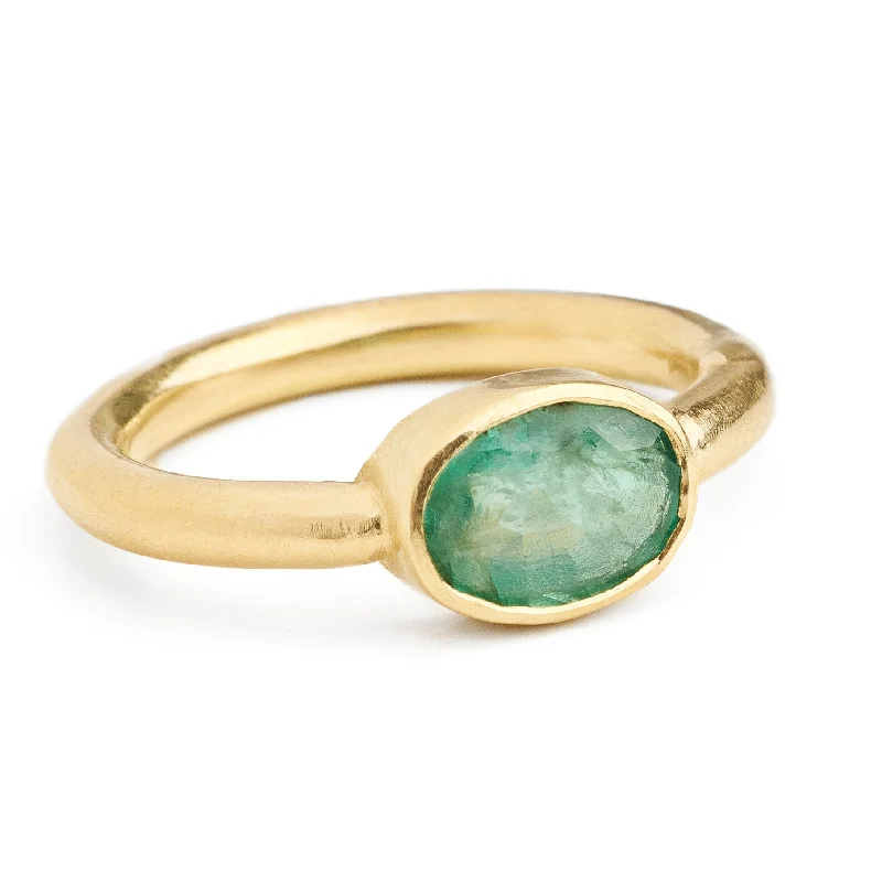 Oval emerald bezel ring