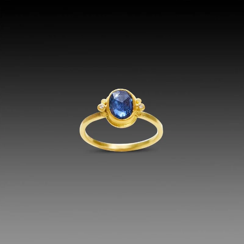 Oval Blue Sapphire Ring with Diamonds