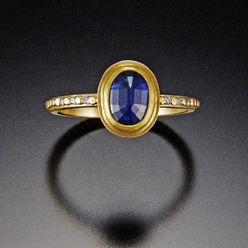 Oval Blue Sapphire Ring with Diamond Band